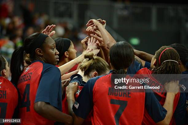 The United States huddle against Angola at the Olympic Park Basketball Arena during the London Olympic Games on July 30, 2012 in London, England....