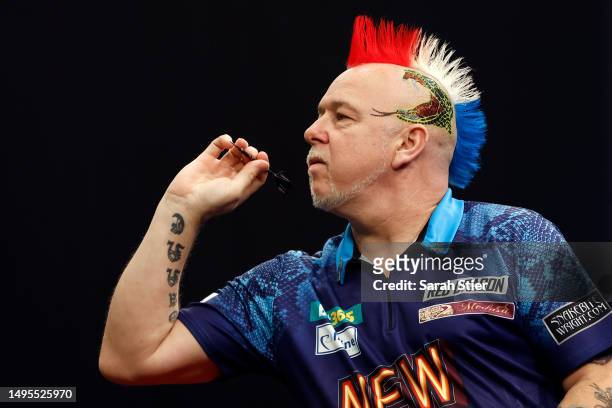 Peter Wright of Scotland competes against Jeff Smith during the 2023 bet365 U.S. Dart Masters First Round at The Hulu Theater at Madison Square...