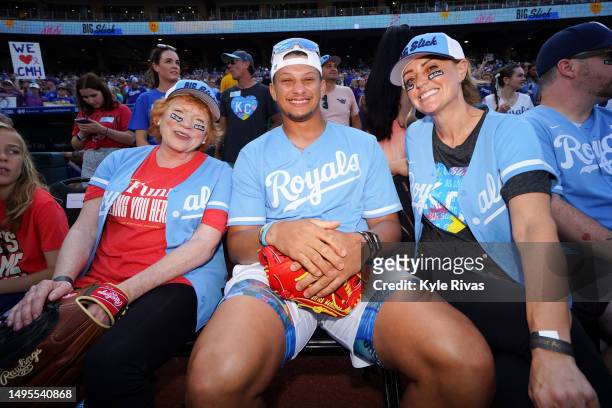 Becky Ann Baker, Patrick Mahomes, and Sarah Tiana pose for a photo before the Celebrity Softball game during the Big Slick Celebrity Weekend...