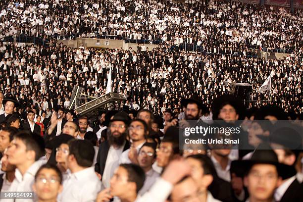 Tens of thousands of Ultra Orthodox Jews attend Siyum HaShas, a celebration marking completion of a seven-and a half year daily study-cycle of the...