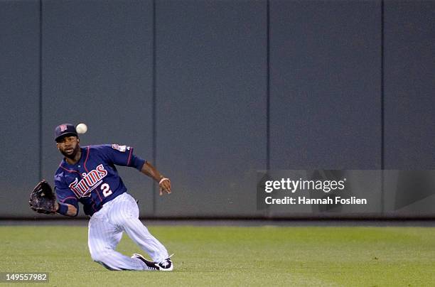 Denard Span of the Minnesota Twins makes a catch in center field against the Chicago White Sox during the seventh inning on July 30, 2012 at Target...