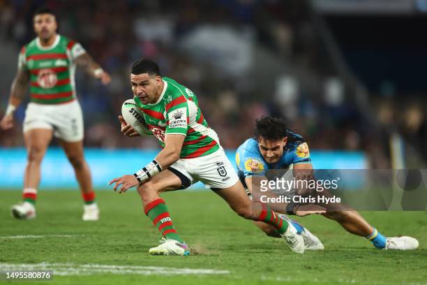 Cody Walker of the Rabbitohs makes a break during the round 14 NRL match between Gold Coast Titans and South Sydney Rabbitohs at Cbus Super Stadium...