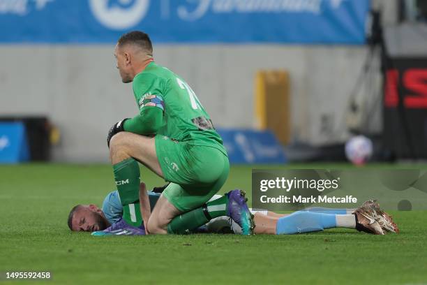 Daniel Vukovic of the Mariners checks Valon Berisha of Melbourne City after they clashed during the 2023 A-League Men's Grand Final match between...