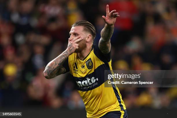 Jason Cummings of the Mariners celebrates kicking a penalty goal during the 2023 A-League Men's Grand Final match between Melbourne City and Central...