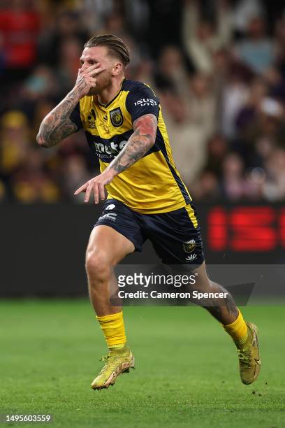 Jason Cummings of the Mariners celebrates kicking a penalty goal during the 2023 A-League Men's Grand Final match between Melbourne City and Central...