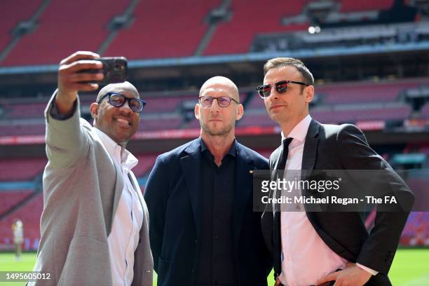 Former Manchester Untied players Dion Dublin, Jaap Stam and Dimitar Berbatov pose for a selfie photograph prior to the Emirates FA Cup Final between...