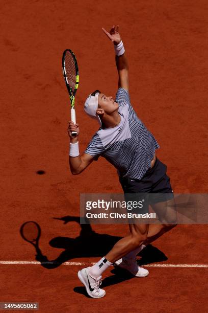Holger Rune of Denmark serves against Genaro Alberto livieri of Argentina during the XXX Third Round Match on Day Seven of the 2023 French Open at...