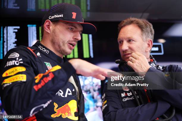 Max Verstappen of the Netherlands and Oracle Red Bull Racing talks with Red Bull Racing Team Principal Christian Horner in the garage during final...