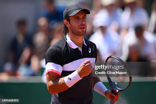 Borna Coric of Croatia celebrates a point against Tomas Martin Etcheverry of Argentina during the Men's Singles Third Round Match on Day Seven of the...