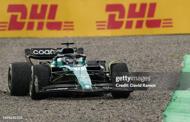 Lance Stroll of Canada driving the Aston Martin AMR23 Mercedes runs wide during final practice ahead of the F1 Grand Prix of Spain at Circuit de...