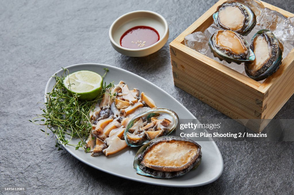 Abalone Gastropod Cooking Abalone Sashimi High-Res Stock Photo - Getty