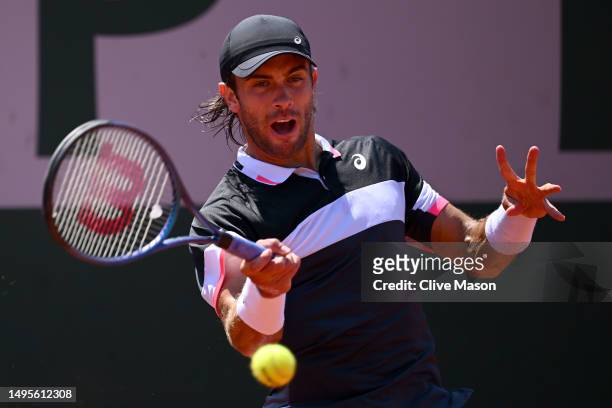 Borna Coric of Croatia plays a forehand against Tomas Martin Etcheverry of Argentina during the Men's Singles Third Round Match on Day Seven of the...