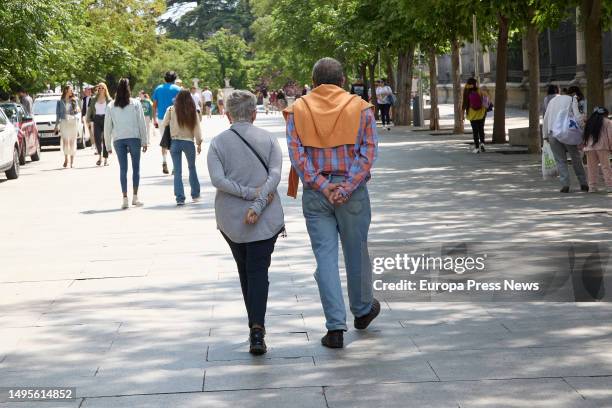 Couple walks along Paseo del Prado, on June 4 in Madrid, Spain. The population over 64 years of age in Spain now exceeds 20% of the total and exceeds...