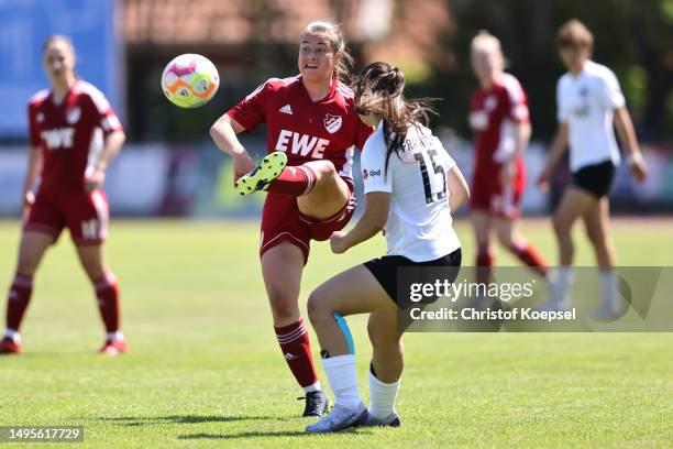 Giulia Vitale of Frankfurt challenges Sophia Marie Schalke of Aurich during the B-Junior Girls Final German Championship Semi Final Leg Two match...