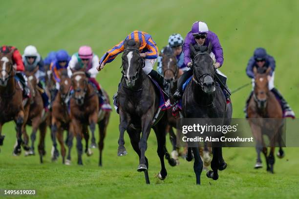 Ryan Moore riding Auguste Rodin win The Betfred Derby from Rossa Ryan and King Of Steel on Derby Day at Epsom Racecourse on June 03, 2023 in Epsom,...