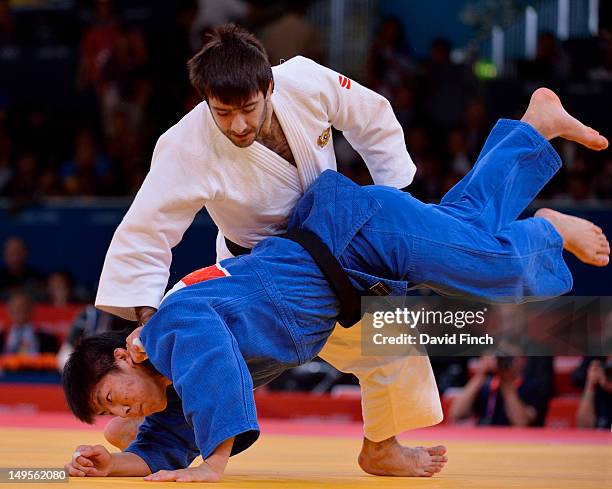 Mansur Isaev of Russia competes against Riki Nakaya of Japan during the Men's -73kg Judo on Day 3 of the London 2012 Olympic Games at ExCeL on July...