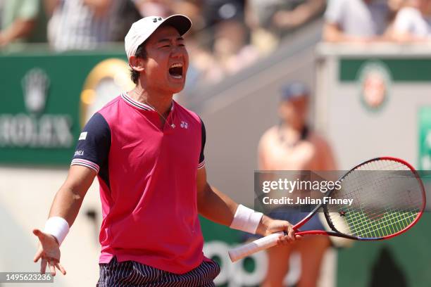 Yoshihito Nishioka of Japan celebrates winning match point against Thiago Seyboth Wild of Brazil during the Men's Singles Third Round Match on Day...