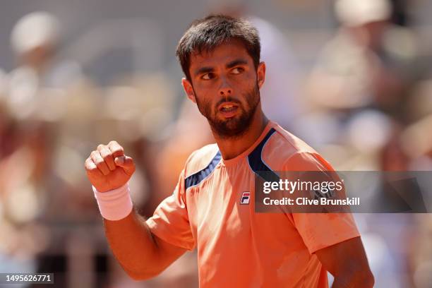 Genaro Alberto Olivieri of Argentina celebrates a point against Holger Rune of Denmark during the Men's Singles Third Round Match on Day Seven of the...