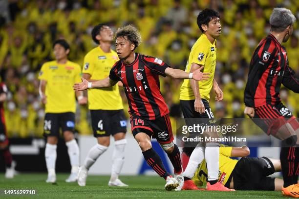 Yoshiaki Komai of Consadole Sapporo celebrates the second goal during the J.LEAGUE Meiji Yasuda J1 16th Sec. Match between Kashiwa Reysol and...