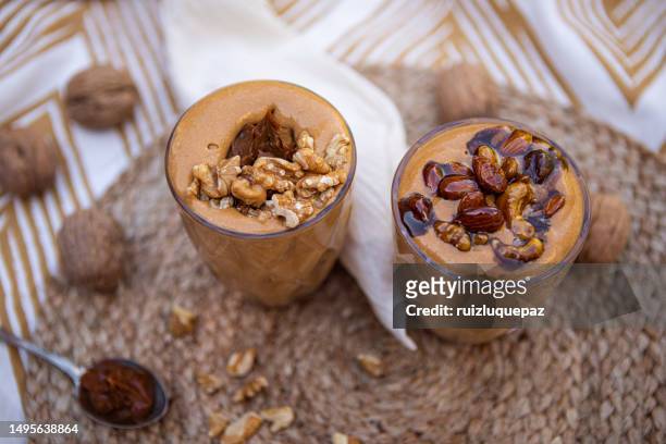 dulce de leche mousse with caramelized dried fruits - sugared almond stock pictures, royalty-free photos & images