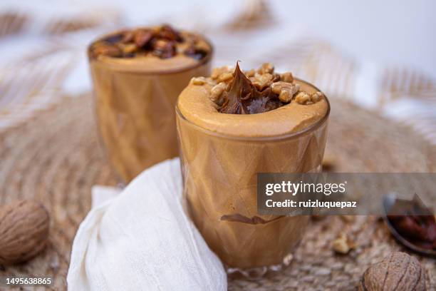 dulce de leche mousse with caramelized dried fruits - dulce de leche stock pictures, royalty-free photos & images
