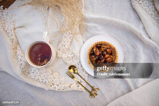 dulce de leche and caramelized dried fruits pie - sugared almond stock pictures, royalty-free photos & images