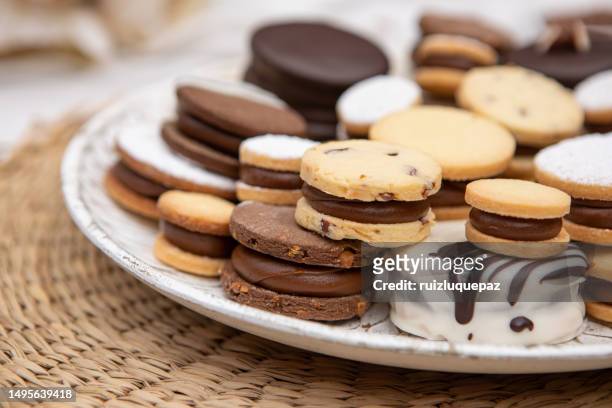 variety of argentinian dulce de leche alfajores - argentinian culture stock pictures, royalty-free photos & images