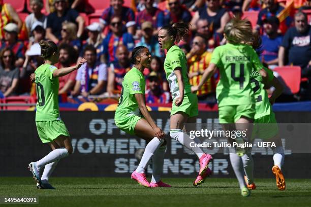 Ewa Pajor of VfL Wolfsburg celebrates with teammates after scoring the team's first goal during the UEFA Women's Champions League final match between...