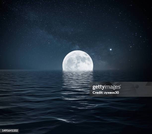 night sky and the moon over the sea - moonlight stock pictures, royalty-free photos & images