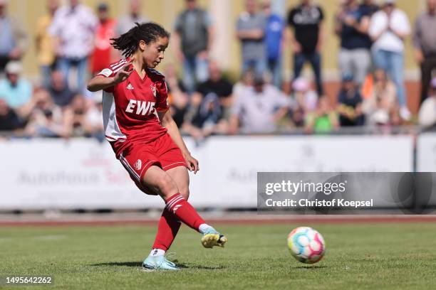 Marie Omoze Okoroh of Aurich scores the decision last penalty during the penalty shoot-out of the B-Junior Girls Final German Championship Semi Final...