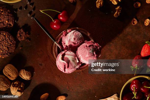 top view of ice cream bowl with nuts and chocolate - ice cream sundae stock pictures, royalty-free photos & images