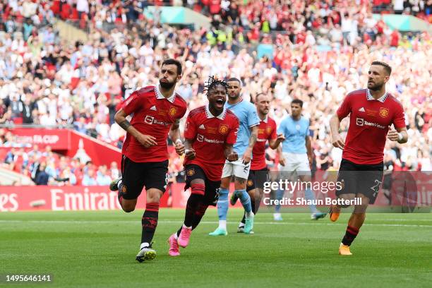 Bruno Fernandes of Manchester United celebrates after scoring the team's first goal from the penalty spot during the Emirates FA Cup Final between...