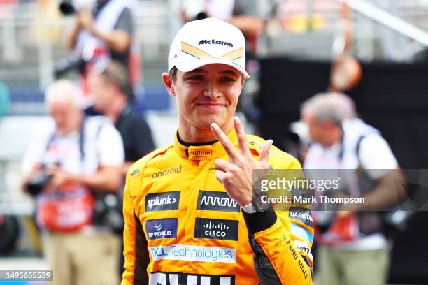 Third placed qualifier Lando Norris of Great Britain and McLaren celebrates in parc ferme during qualifying ahead of the F1 Grand Prix of Spain at...