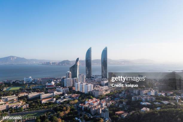 aerial photography of beautiful seaside city buildings - xiamen fotografías e imágenes de stock