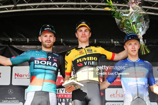 Jordi Meeus of Belgium and Team BORA - hansgrohe on second place, race winner Olav Kooij of The Netherlands and Team Jumbo-Visma and Robbe Ghys of...