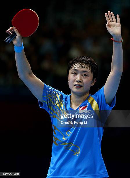 Tianwei Feng of Singapore celebrates during the Women's Singles Table Tennis quarter-final match against Kyung Ah Kim of Korea on on Day 4 of the...