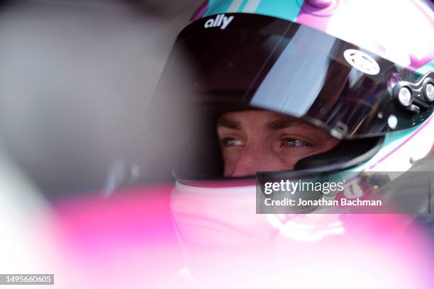 Alex Bowman, driver of the Ally Chevrolet, sits in his car during practice for the NASCAR Cup Series Enjoy Illinois 300 at WWT Raceway on June 03,...