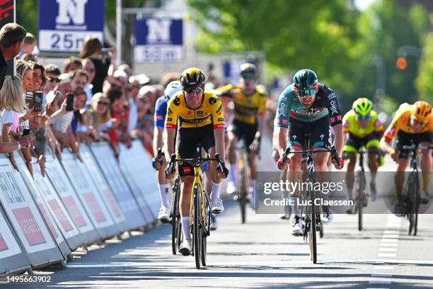 Olav Kooij of The Netherlands and Team Jumbo-Visma celebrates at finish line as race winner ahead of Jordi Meeus of Belgium and Team BORA - hansgrohe...