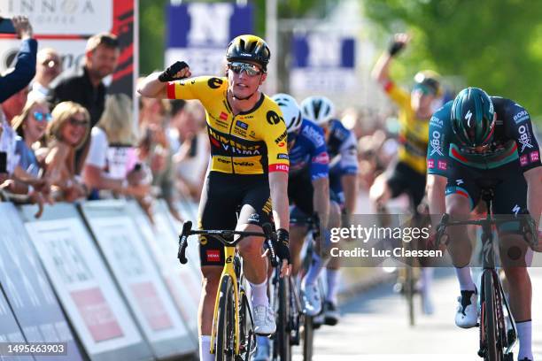 Olav Kooij of The Netherlands and Team Jumbo-Visma celebrates at finish line as race winner ahead of Jordi Meeus of Belgium and Team BORA - hansgrohe...