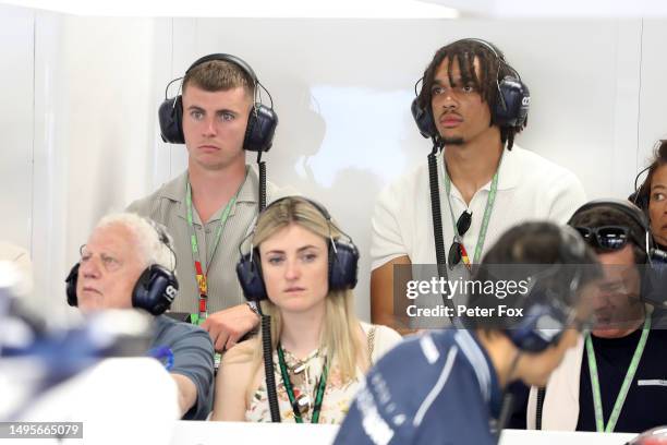 Mason Mount and Trent-Alexander Arnold watch on in the Scuderia AlphaTauri garage during qualifying ahead of the F1 Grand Prix of Spain at Circuit de...