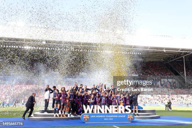 Barcelona players celebrate with the UEFA Women's Champions League Trophy after the team's victory during the UEFA Women's Champions League final...