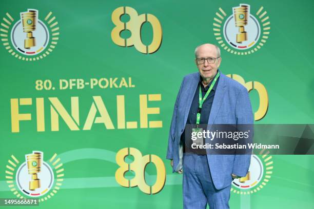 Former manager of Bundesliga club Bayer Leverkusen Reiner Calmund pose for a picture at the VIP entrance prior to the DFB Cup final match between RB...