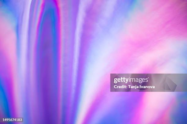 abstract neon holographic background, with shimmering, iridescent effect with a rainbow of colors show the alternate reality of the metaverse. meta and web backgrounds and textures. - couleur irisée photos et images de collection