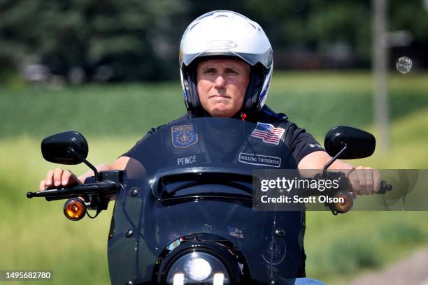 Former Vice President Mike Pence rides a Harley Davidson motorcycle during Joni Ernst's Roast and Ride event on June 03, 2023 in Des Moines, Iowa....