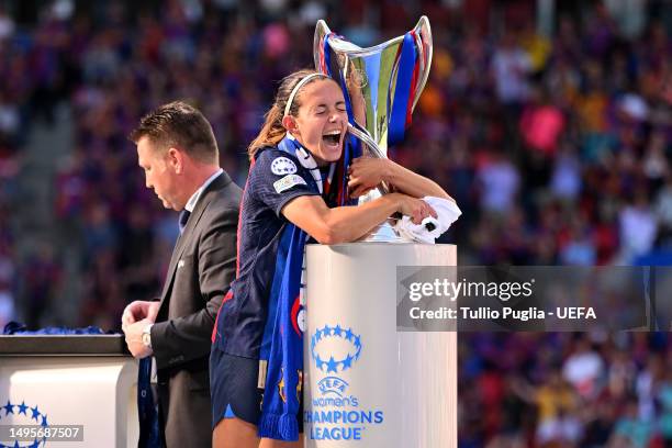 Aitana Bonmati of FC Barcelona embraces the UEFA Women's Champions League Trophy after the UEFA Women's Champions League final match between FC...