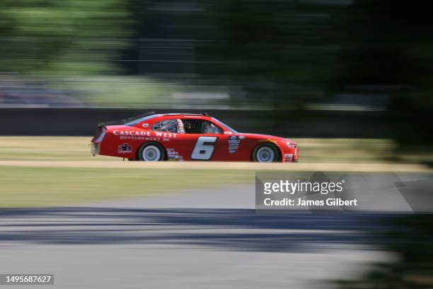 Brennan Poole, driver of the Cascade West Development Inc. Chevrolet, drives during qualifying for the NASCAR Xfinity Series Pacific Office...