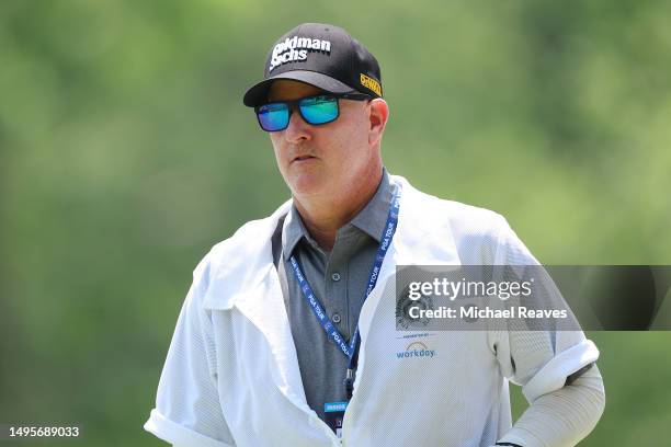 Caddie Joe LaCava walks the second green during the third round of the Memorial Tournament presented by Workday at Muirfield Village Golf Club on...