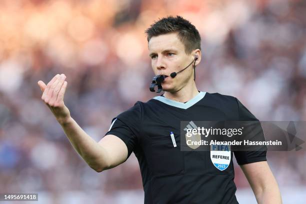 Referee, Daniel Siebert blows the whistle during the DFB Cup final match between RB Leipzig and Eintracht Frankfurt at Olympiastadion on June 03,...