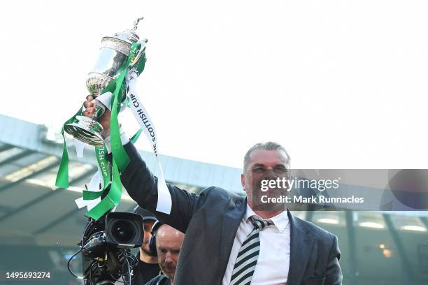 Angelos Postecoglou, Manager of Celtic lifts the Scottish Cup trophy after the team's victory during the Scottish Cup Final between Celtic and...