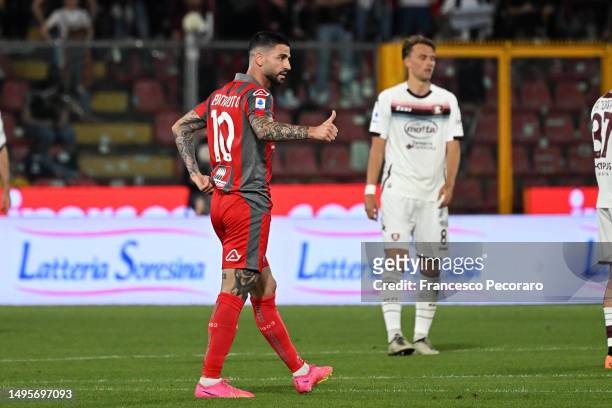 Cristian Buonaiuto of US Cremonese celebrates after scoring the 1-0 goal during the Serie A match between US Cremonese and Salernitana at Stadio...